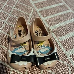 Mini Melissa Alice in Wonderland pink shoes with black bow